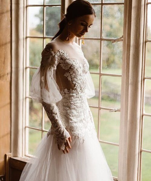 bride in Emma Beaumont dropped waist wedding dress