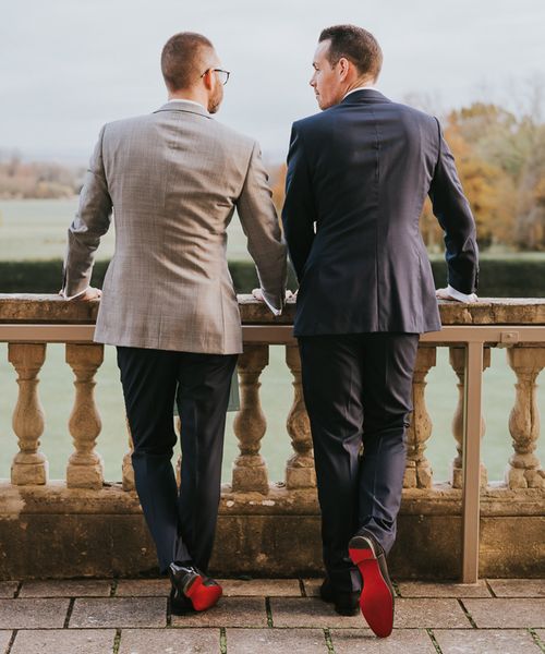 Louboutin groom shoes worn by two grooms for their country house gay wedding.