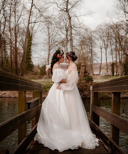 Ethereal wedding dress and inspiration at Mapledurham House and Estate with two brides and romantic flowers by Katherine And Her Camera