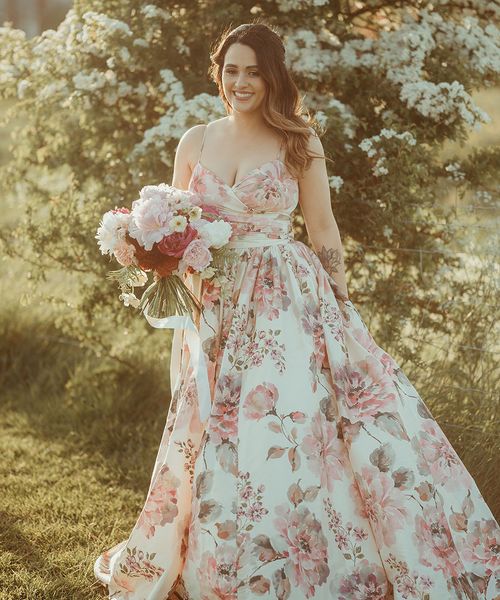 Bride in a hand painted silk wedding dress by Wendy Makin.