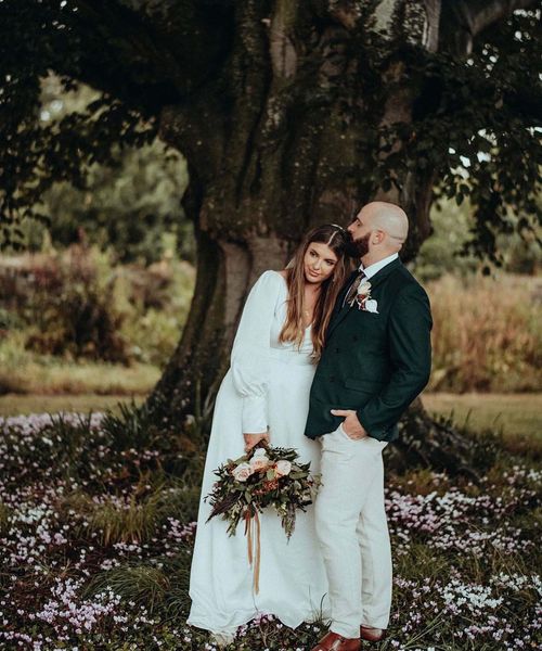 Luna Bea Bridal gown for an autumnal wedding at Elmore Court with dried flowers and rust tones 