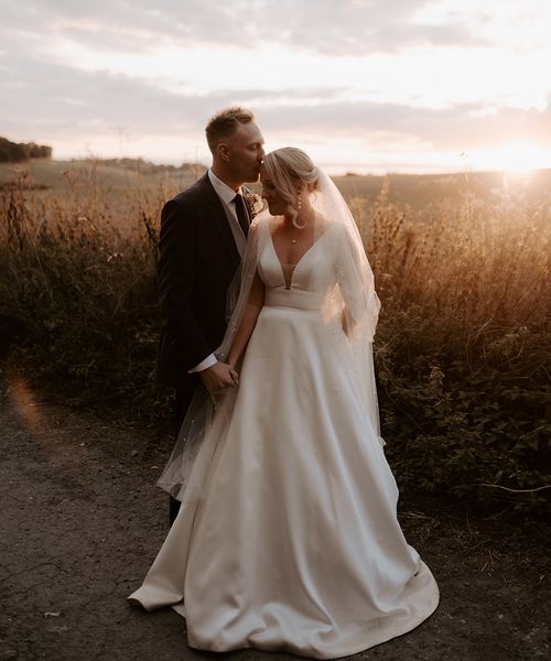 A rustic wedding at Bake Barn during golden hour.