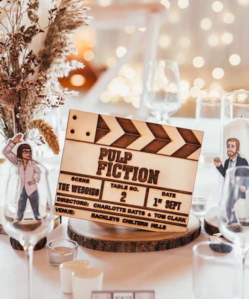 rustic cinema theme wedding table centrepiece decor at Rackleys Barn