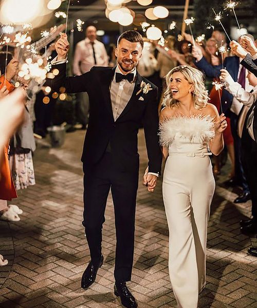 Nadine Merabi wedding jumpsuit Olegs Samsonovs Photography