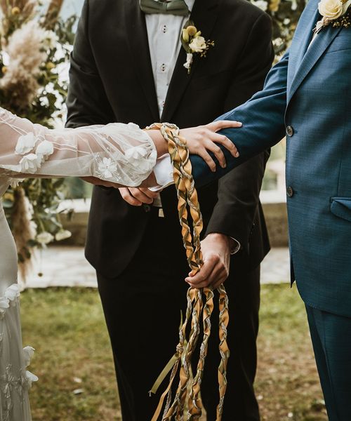 What is a Handfasting ceremony? We share everything you need to know, plus how to do it.