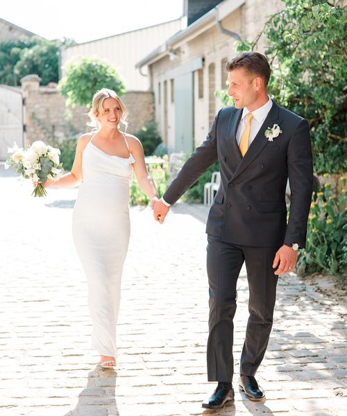 pregnant-bride-with-groom-at-chateau-de-cormicy-wedding