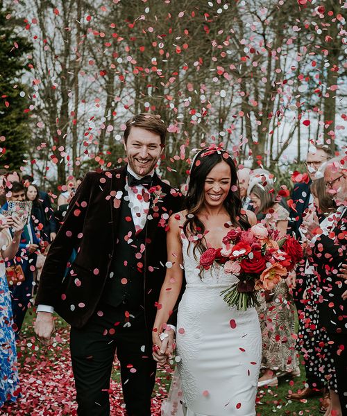 pink-and-red-wedding-confetti-moment-at-halton-grove-weddings