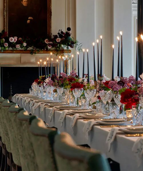 The Ned wedding reception table decor, including flowers and candles