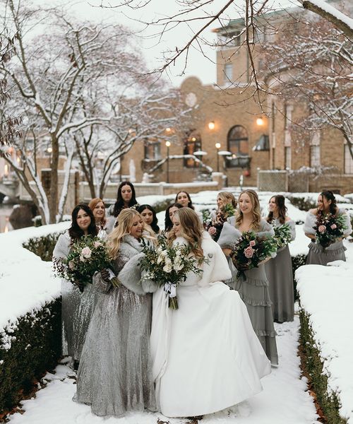 winter-wedding-with-silver-bridesmaid-dresses-and-bride-in-princess-wedding-dress