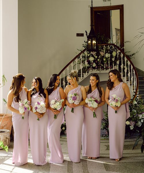 bridesmaids-wearing-lilac-bridesmaid-dresses