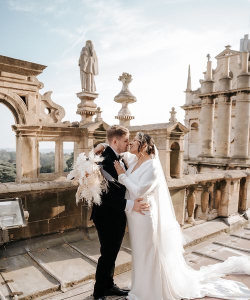 bride-and-groom-at-luxe-monochrome-wedding-with-dried-flowers