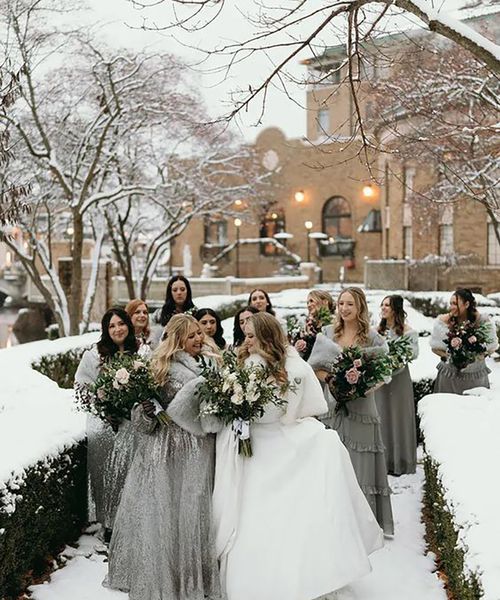 silver winter bridesmaid dresses for snowy gothic cathedral wedding