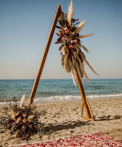 beach picnic set-up for beach honeymoon location or destination wedding