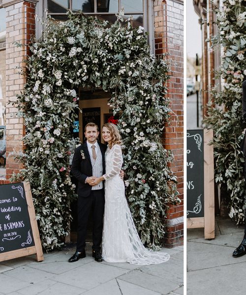 Floral Arch and Bride in Batwing Sleeve Halfpenny Dress for London Pub Wedding at The Star in Highgate, Images by Caitlin + Jones Photography