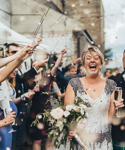 Metallic Confetti Cannons and Paper Lanterns with Bride in Beaded Shoulder Eliza Jane Howell Dress for Stoke Newington Wedding, shot by Miss Gen Photography