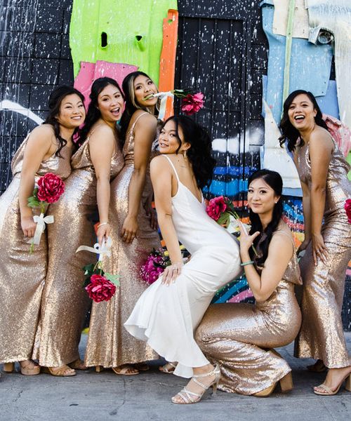 Las Vegas Wedding with Gold Sequin Bridesmaids Dresses and Silk Flowers | BHLDN Wedding Dress | Neon Museum | Chris Barber Photography