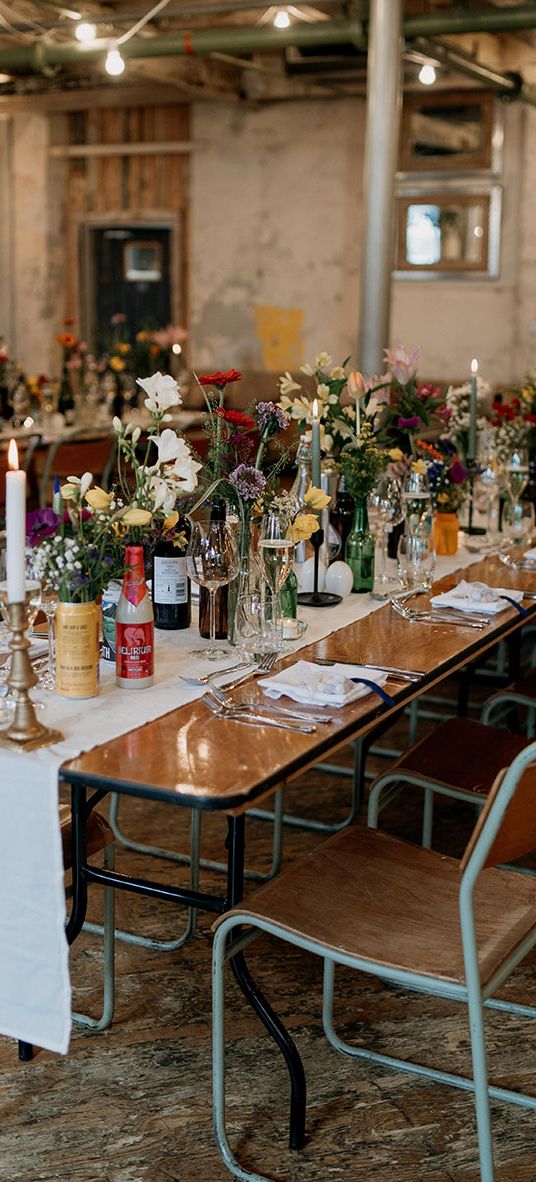 Wildflower wedding theme at Holmes Mill wedding with botanical tablescape.