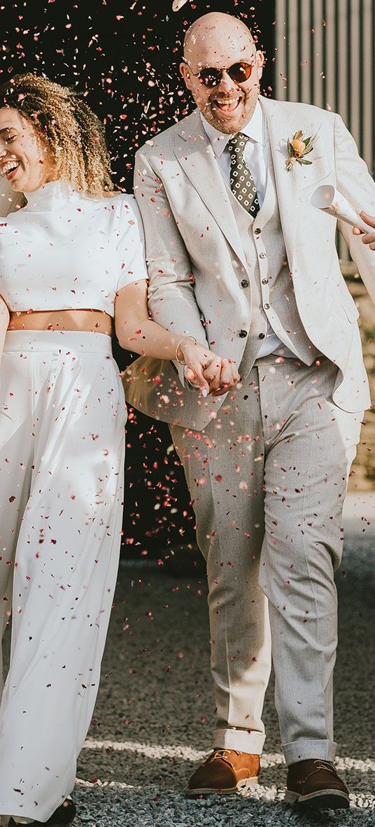 confetti moment for bride and groom