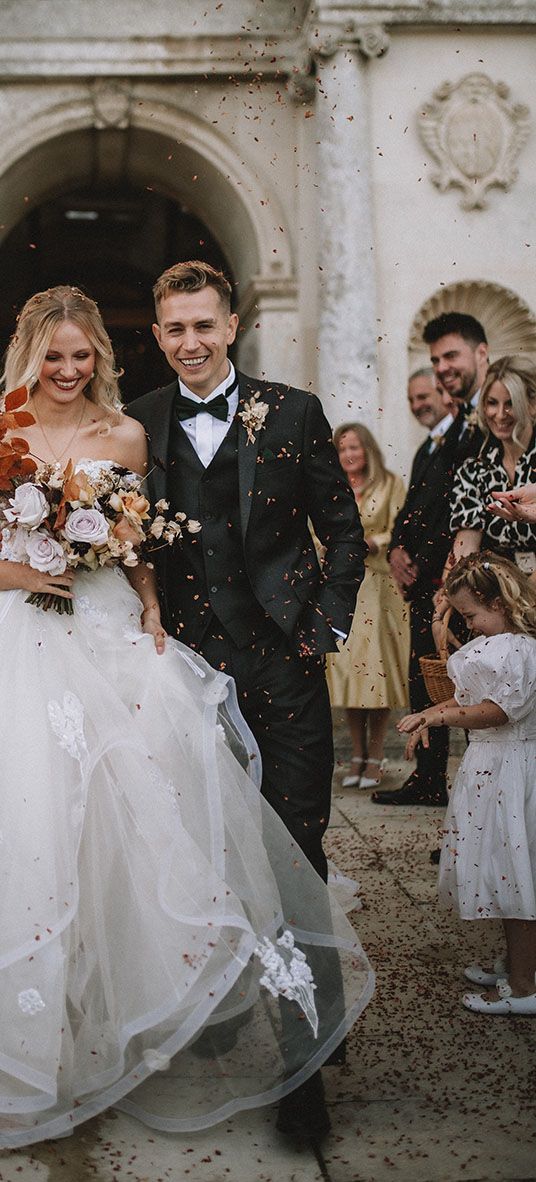 Vamps star James McVey wedding to model girlfriend Kirstie Brittain at Lulworth Castle with a bespoke wedding dress by Divine Day Photography