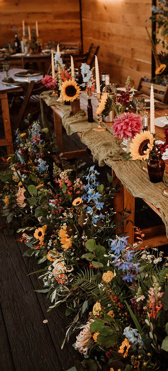 Seasonal flowers for rustic wedding tablescape.