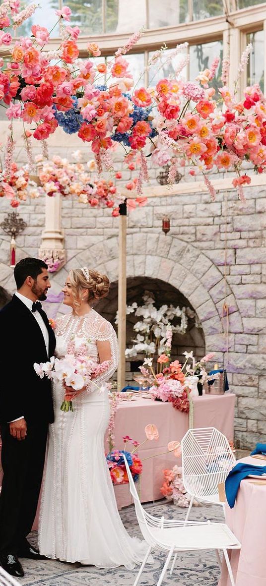 De Vere Tortworth Court wedding with pink flower decorations.