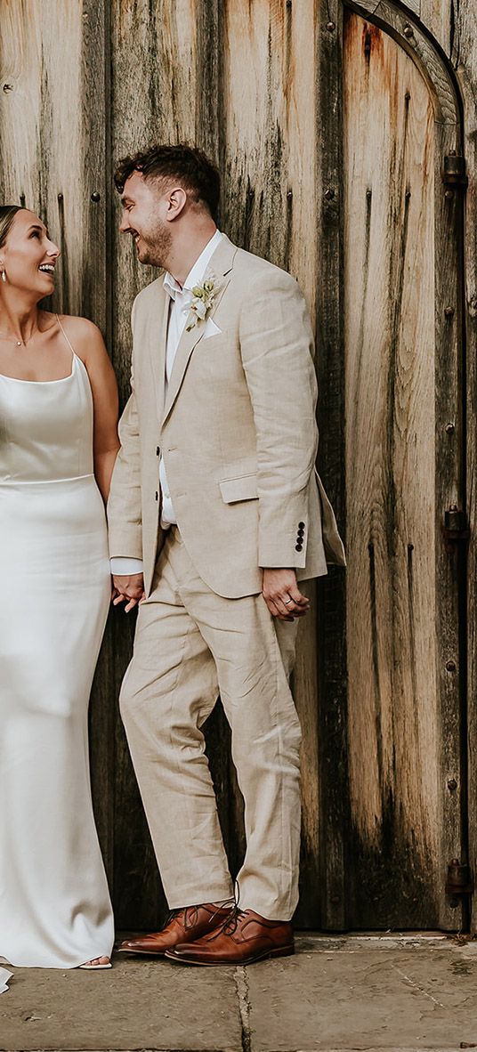 Shustoke Barns wedding with bride wearing a satin slip wedding dress