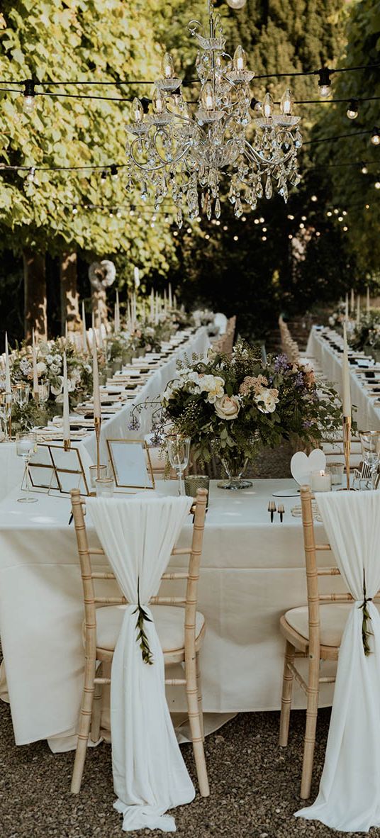 Sweetheart table for modern seating arrangement at outdoor wedding