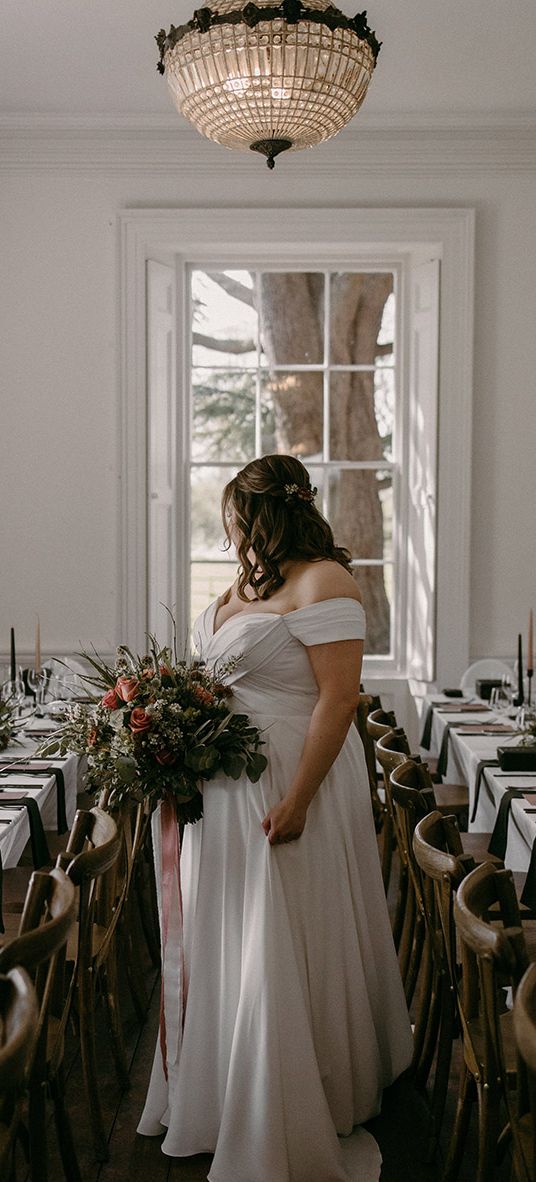 Aswarby Rectory wedding venue with the bride in a Madi Lane wedding dress