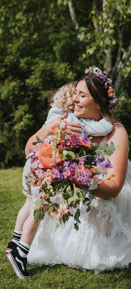 Kids at weddings at outdoor summer boho wedding.