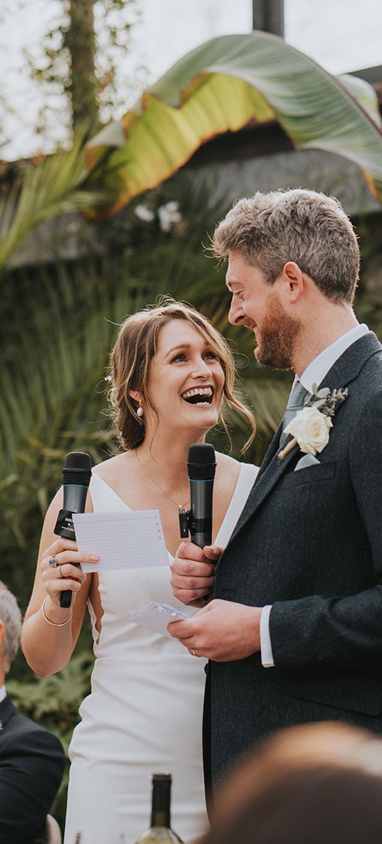 bride and groom performing their joint wedding speech