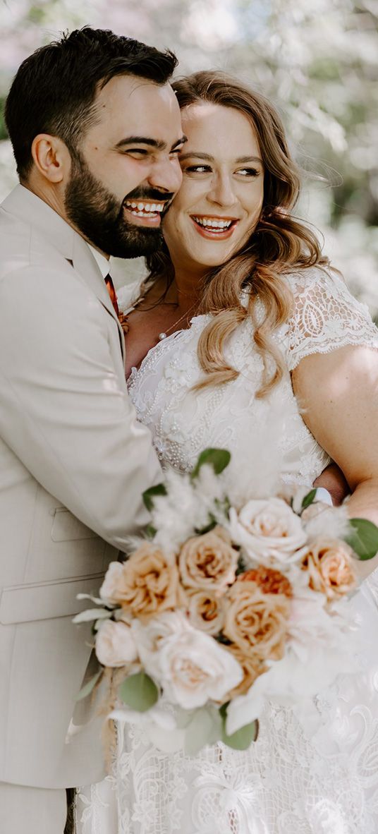 Bride and groom embrace for their weddings under 40k