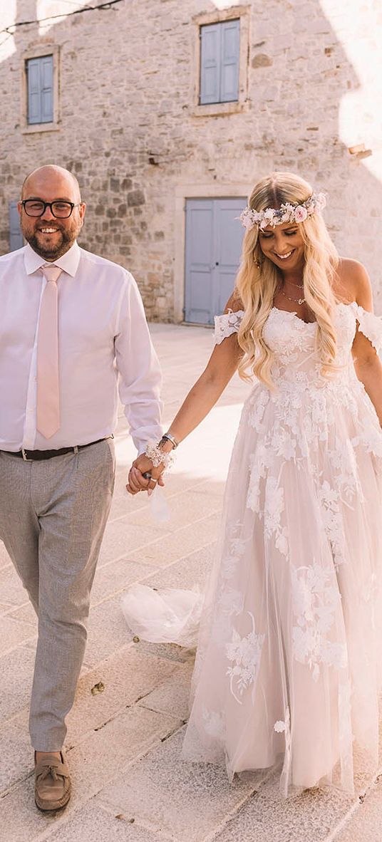 Bride and groom at their Croatia wedding with a boho theme.