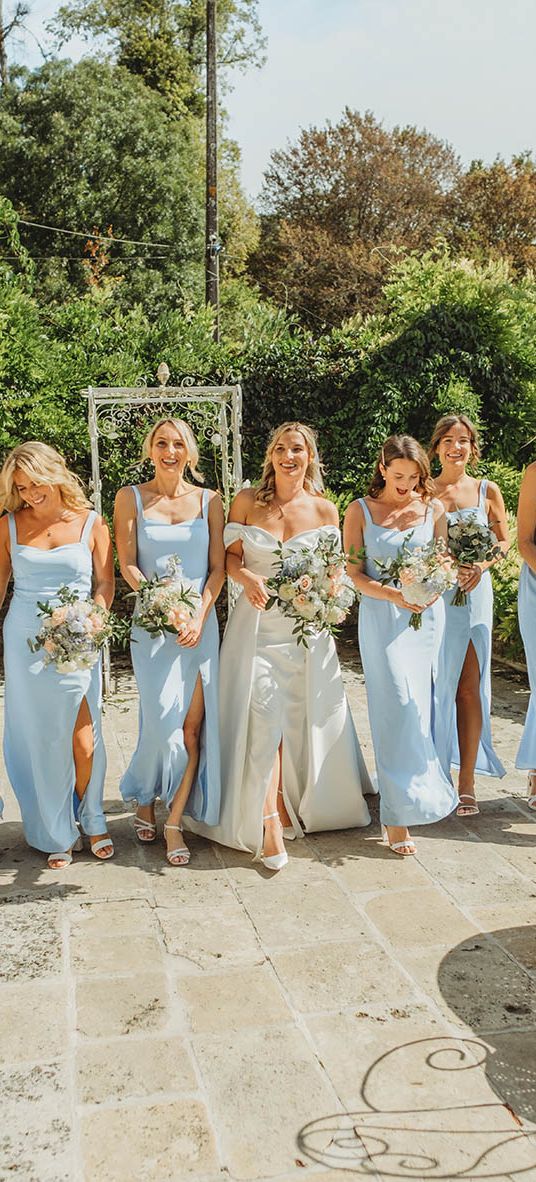 Powder blue bridesmaid dresses at destination wedding in France