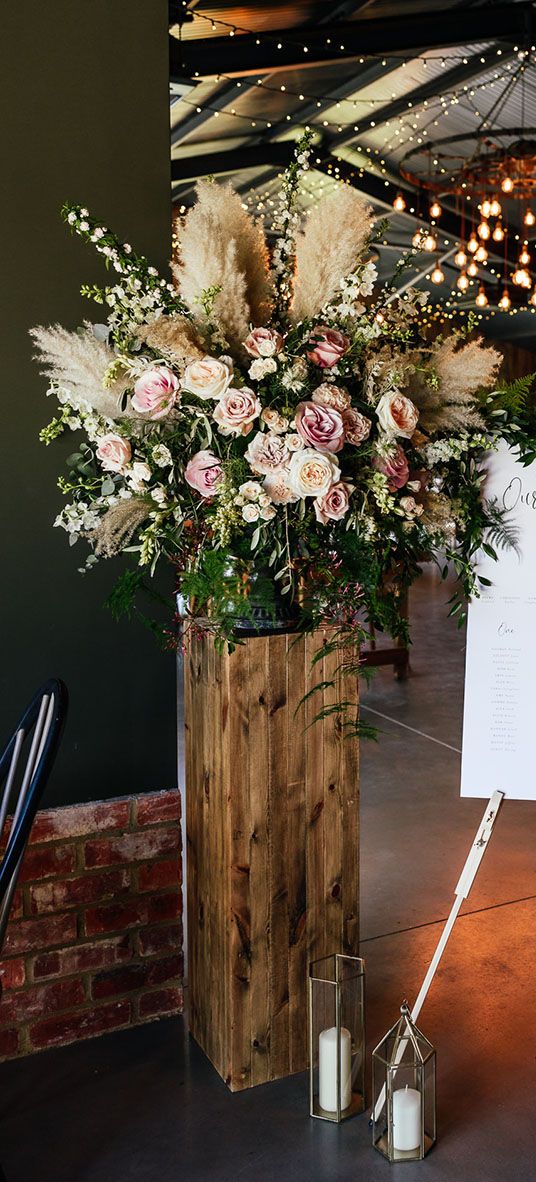 rustic barn wedding with wedding bouncy castle and sweet table