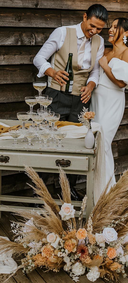 Boho wedding inspiration at The Canary Shed with a muted colour palette, drapes, macrame and wicker wedding decor by Aurora Grey Photography