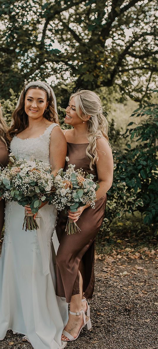 bride and bridesmaids in brown bridesmaid dresses at Chycara wedding