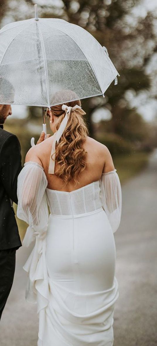 what to do it if rains on your wedding day with clear umbrella