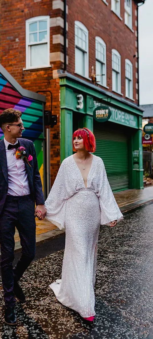 bride-wearing-asos-sequin-bat-wing-wedding-dress-with-groom-in-purple-checkered-suit-Dandrew-Photography