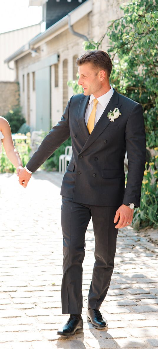 pregnant-bride-with-groom-at-chateau-de-cormicy-wedding