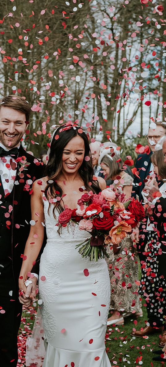 pink-and-red-wedding-confetti-moment-at-halton-grove-weddings