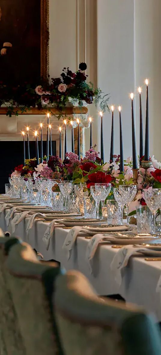 The Ned wedding reception table decor, including flowers and candles