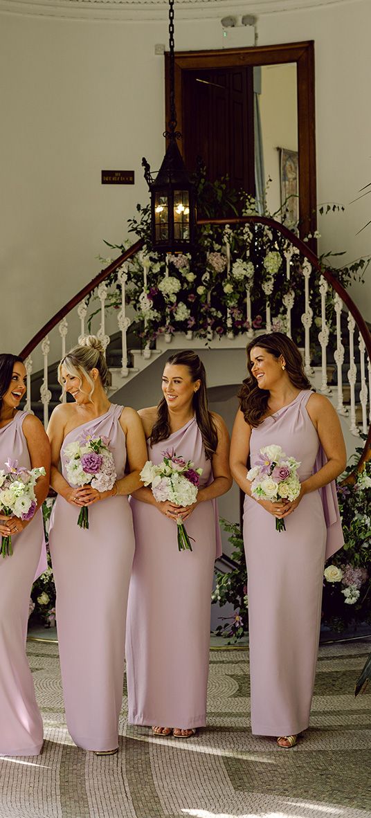 bridesmaids-wearing-lilac-bridesmaid-dresses