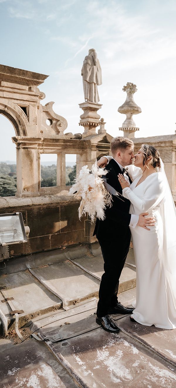 bride-and-groom-at-luxe-monochrome-wedding-with-dried-flowers