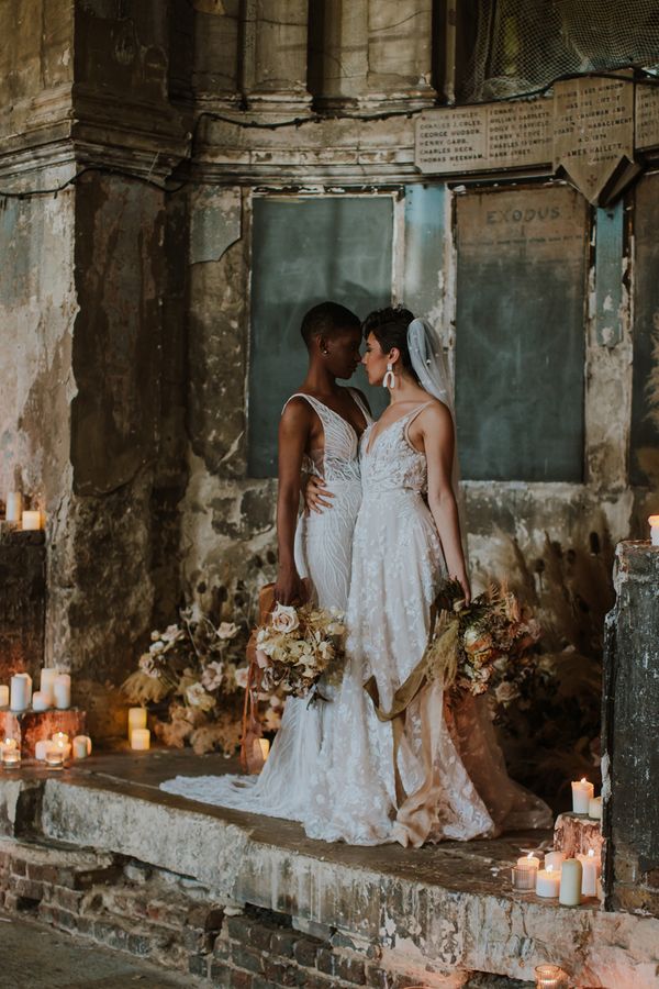 Asylum London Wedding inspiration with Two brides in different wedding dress and dried flower wedding table decor