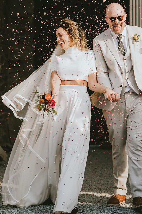 confetti moment for bride and groom