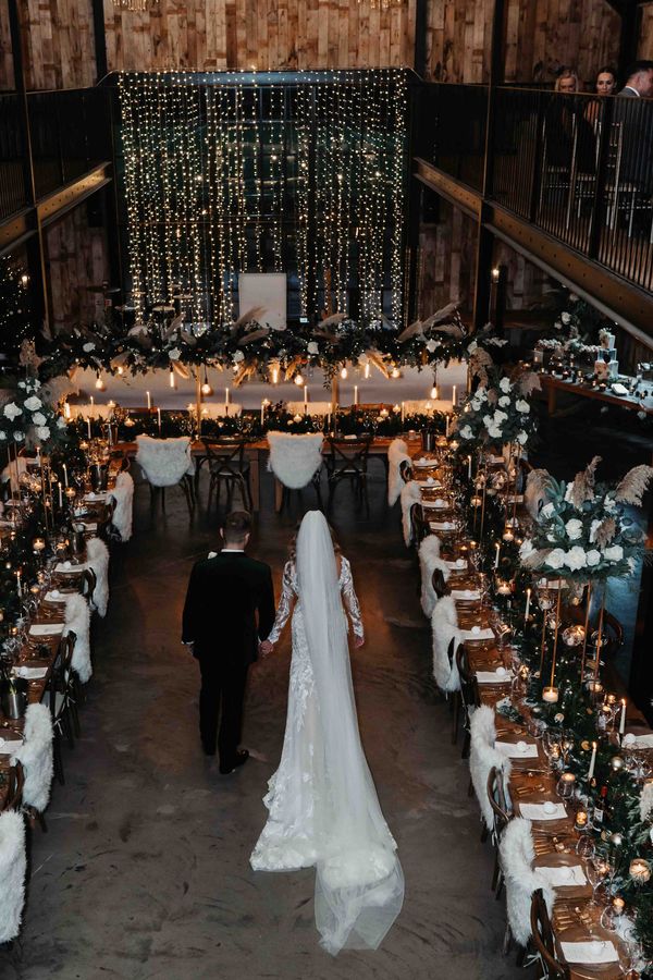 Fairy lights black tie winter wedding at the Hidden River Barn in the Lake District.