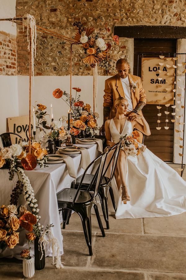 Mustard grooms suit and modern neutral wedding inspiration 
