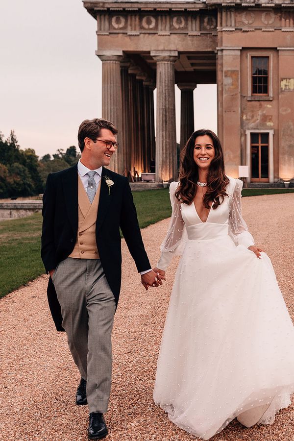 Mansion wedding at The Grange in Hampshire with the bride in a Sassi Holford pearl wedding dress.