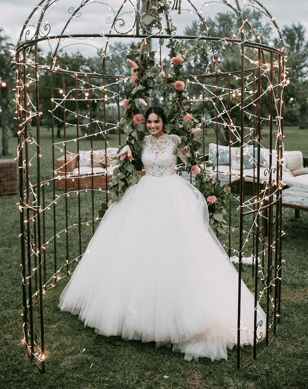 Tulle skirt princess wedding dress with long sleeves and lace detail