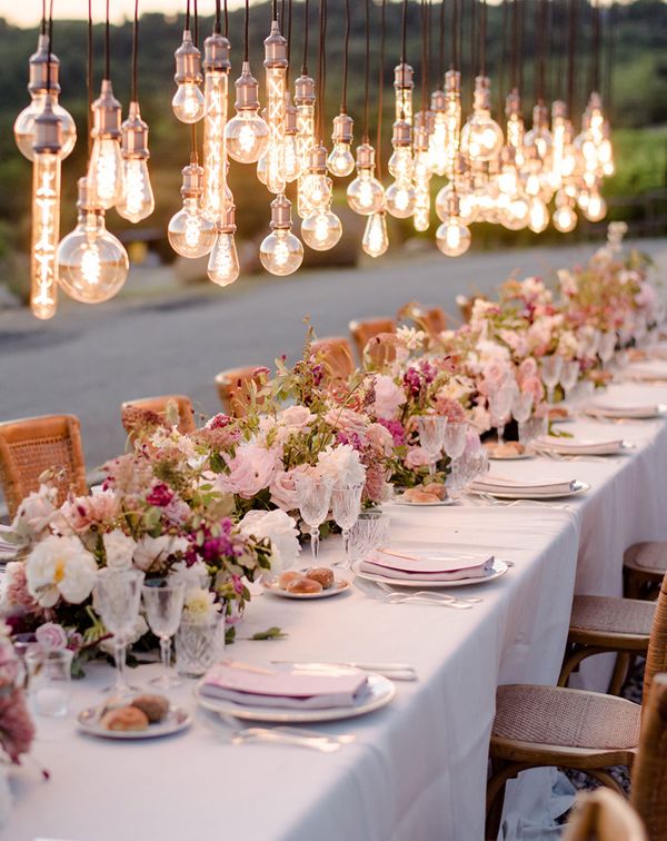 tring warm Edison bulbs overhead wedding reception